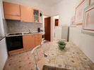 Kitchen and dining area apartment coast dining area